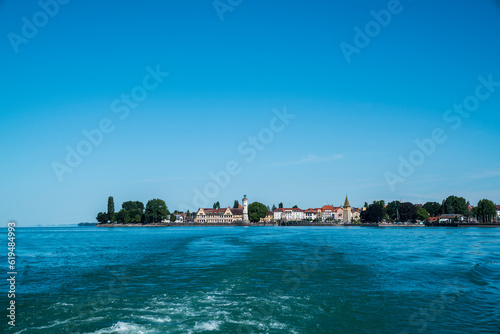 Obraz na płótnie Germany, Bodensee lake constance, beautiful view on historical city of lindau island from ferry on the water in summer with blue sky and sun w salonie