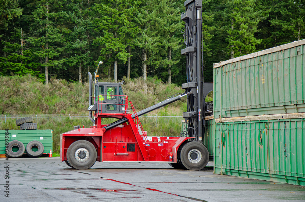 Red Forklift with Waste Shipping Containers Red Forklift with Waste Shipping Containers