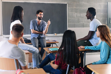 Teenager student class and young teacher sharing group discussion at High School - Education MentalHealth Support
