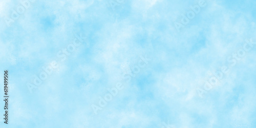 blue sky with clouds. Light sky blue shades watercolor background.Grunge blue background with space for text,watercolor abstract painting of blue grunge texture.	