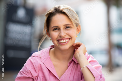 Pretty young woman outside in the city