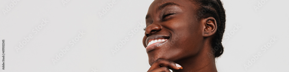 Young beautiful happy smiling african woman with braided hair Young beautiful happy smiling african woman with braided hair