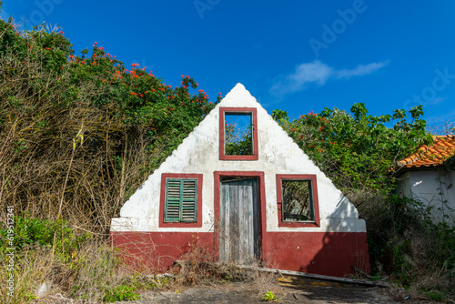 Ruins of a traditional triangular madeiran house in the island of Madeira, Portugal photo