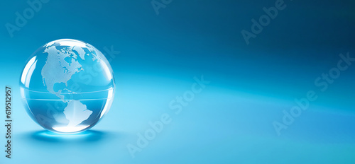 Transparent globe on blue background. Banner. Education concept. Studying maps and using geographic tools. Innovative educational materials. Tourism and travel