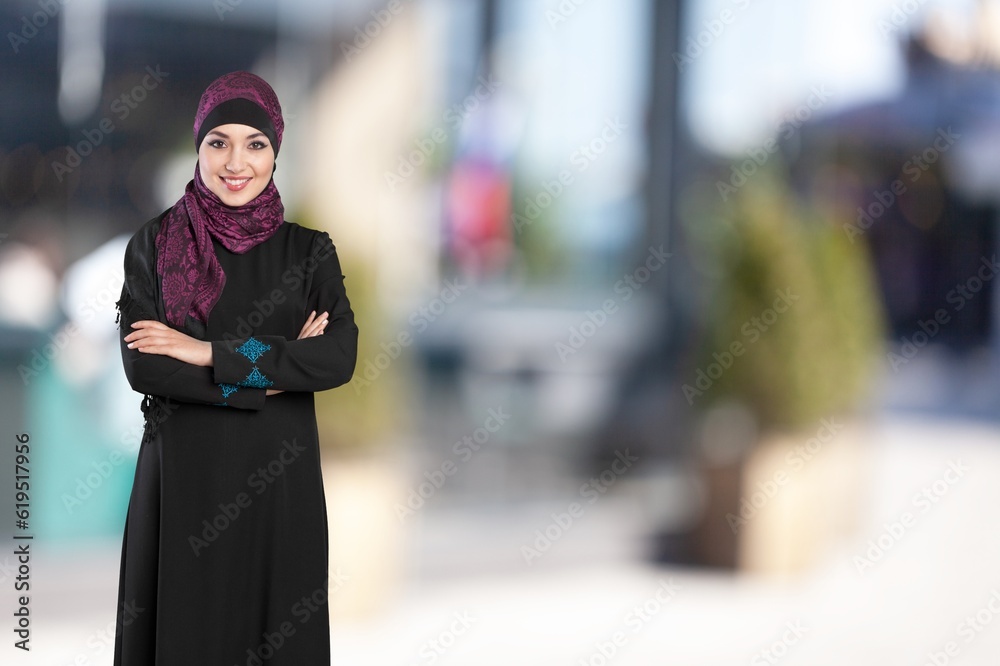 Happy Arab young woman on city street Happy Arab young woman on city street
