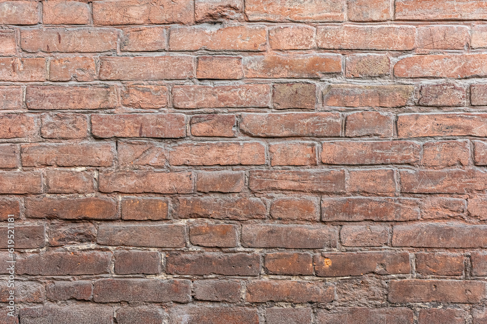Red, White, Green, Pink, Paint, Mold, Wall Background. Old Grungy Brickwork Horizontal Texture. Brickwall Backdrop. Structure With Broken Stucco And Plaster. Red, White, Green, Pink, Paint, Mold, Wall Background. Old Grungy Brickwork Horizontal Texture. Brickwall Backdrop. Structure With Broken Stucco And Plaster.
