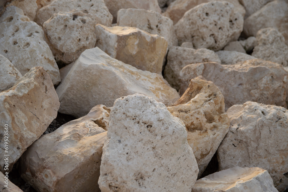 Close-up of breakwater made of white boulder rocks Close-up of breakwater made of white boulder rocks