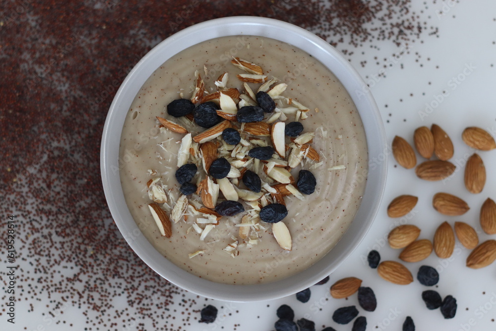 Ragi porridge. A porridge made of finger millet flour, sweetened with ...