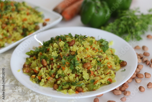 Quadro su tela Vegetable Poha is a quick breakfast or snack made of beaten rice or flattened rice along peanuts, carrots and chilies