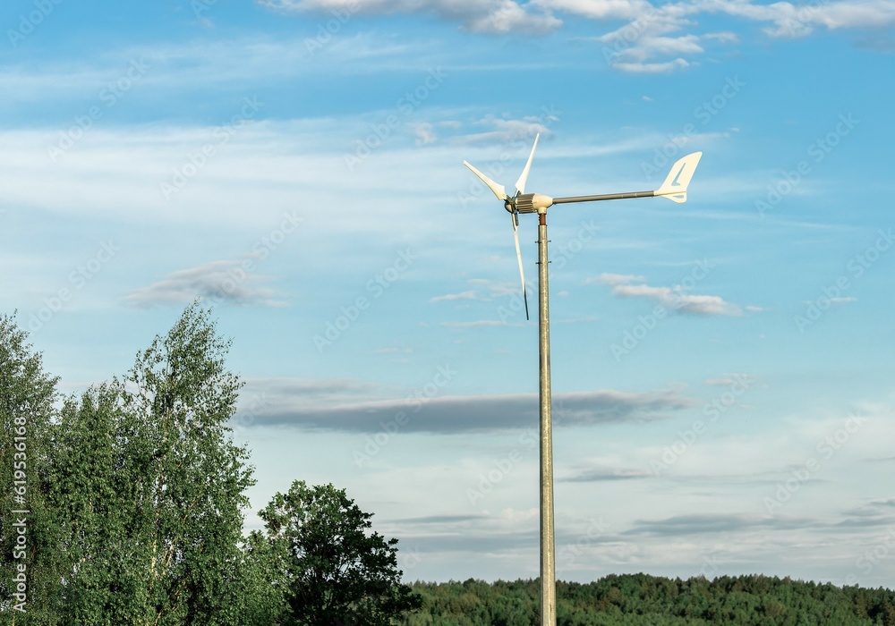 Fototapeta premium Wind electric power energy generator. Sustainable electric green electricity production