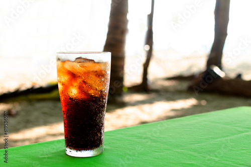 Obraz na plátně Cool freshly Cola soad whiskey and ice on table background, Summer drinks with i