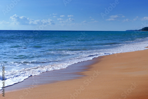 Light blue sea waves and island on clean sandy beach  Tropical white sand beach and soft sunshine background