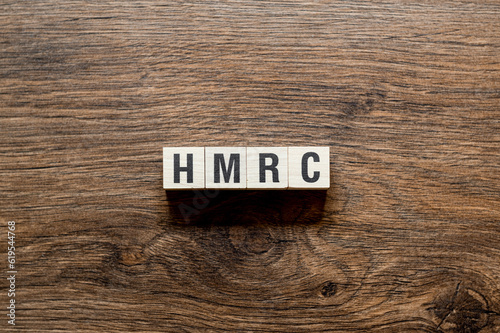 HMRC - majestys revenue and customs,word concept on building blocks, text photo