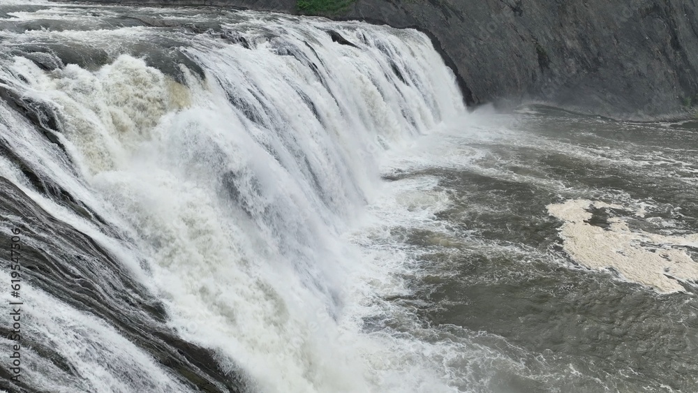 Rapids of Cohoes waterfall on Mohawk river in New York State natural wonder and tourist attraction with visitor overlook in Waterford, NY near Albany Rapids of Cohoes waterfall on Mohawk river in New York State natural wonder and tourist attraction with visitor overlook in Waterford, NY near Albany