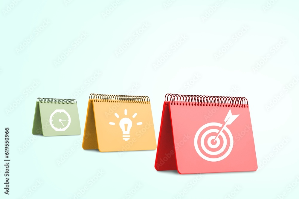 Business plan with goal icon signs on desk calendar Business plan with goal icon signs on desk calendar