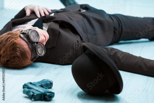 Steampunk agent's demise, killed by lover-enemy