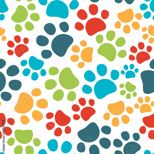 Colorful pet paws seamless pattern. Cat or dog footprint on white background. Vector illustration. It can be used for wallpapers, wrapping, cards, patterns for clothes and other.