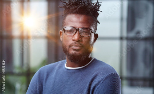 businessman with glasses dressed in blue casual clothes