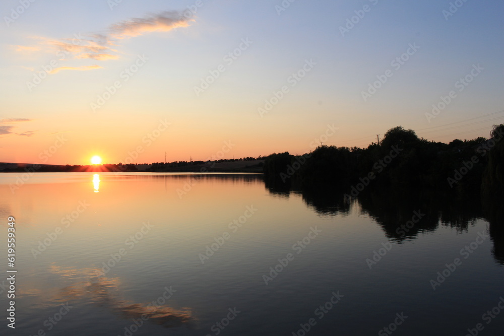A sunset over a lake