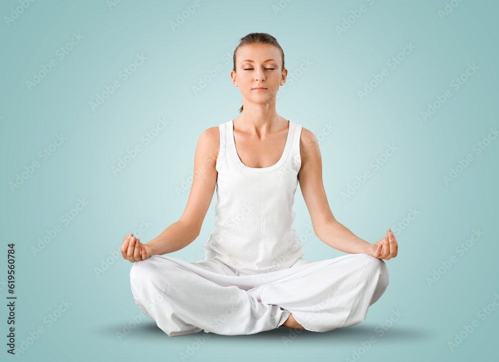 Happy young woman in yoga pose relax meditate Happy young woman in yoga pose relax meditate