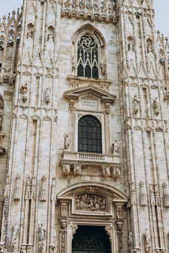 Milan, Italy- May 13, 2023: View of the Milano Duomo Cathedral Cathedral. top tourist attraction of Milan. Gothic style cathedral is dedicated to St Mary. located at the Piazza del Duomo square.