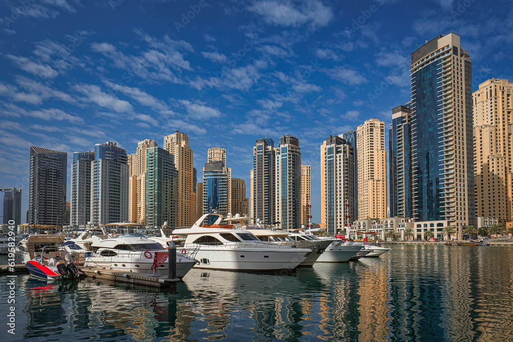 United Arab Emirates, Dubai Marina skyline cityscape from the bay.