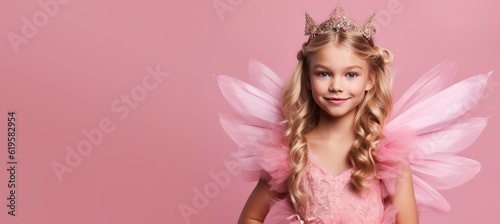 Cute Young Girl Dressed as a Fairy Princess for Halloween on an Pink Banner with Space for Copy