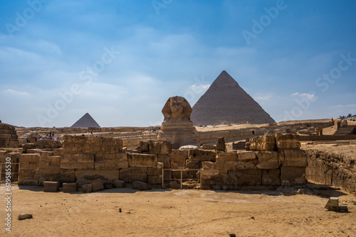 The Great Sphinx at the Giza pyramid complex,  Giza necropolis is home to the Great Pyramid, the Pyramid of Khafre, and the Pyramid of Menkaure, 
 in Cairo, Egypt.  Travel and history.