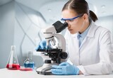 Professional scientist working in modern laboratory, looking in a microscope, AI generated image
