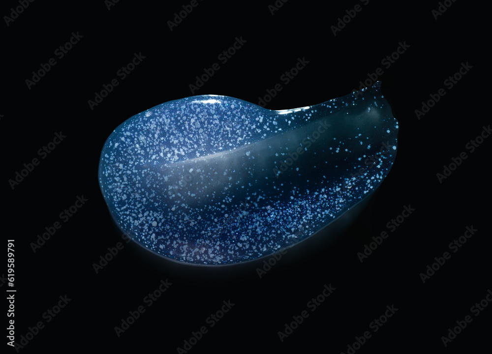 Glowing shimmer gel isolated on black. Liquid gel cosmetic smudge texture dark blue background Glowing shimmer gel isolated on black. Liquid gel cosmetic smudge texture dark blue background