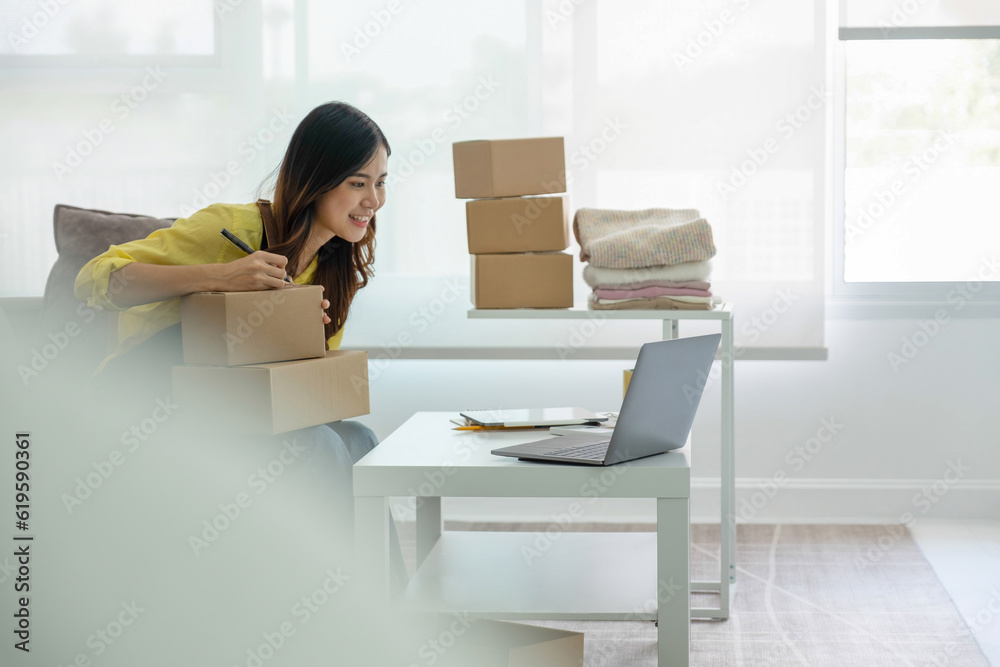 Online business owner preparing parcel for customer shipment. Online business owner preparing parcel for customer shipment.