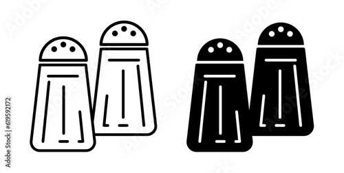 Salt and pepper bottles icon set in black color.