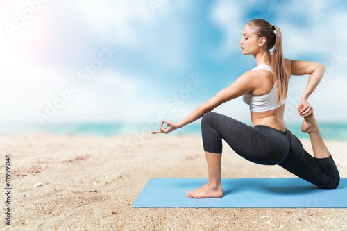 Young relax woman do yoga outdoor at beach, © BillionPhotos.com