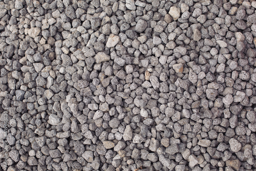 Gray stones texture. Natural background. Small road stone background, gravel pebbles stone texture, granite,marble. Pebbles in the ground. Texture of little rocks. Gray stones texture. Natural background. Small road stone background, gravel pebbles stone texture, granite,marble. Pebbles in the ground. Texture of little rocks.