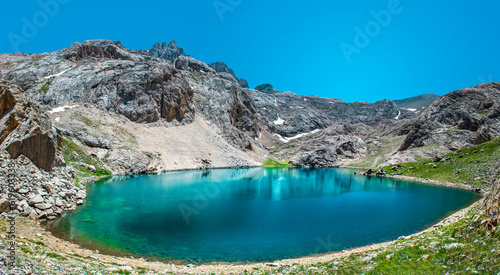 Beautiful panoramic landscape of mountain lake between Bolkar Mountain and Taurus Mountain. Nigde, Turkey. It is known black lake. Volcanic crater. Travel background.