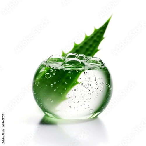 Moisturizing gel in a transparent sphere against the background of juicy Aloe. A storehouse of amino acids and vitamins for natural skin care. Cosmetic eco-friendly Aloe Vera gel in a glass bowl. 