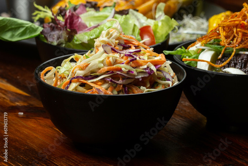 delicious coleslaw salad based on carrots, white cabbage and red cabbage