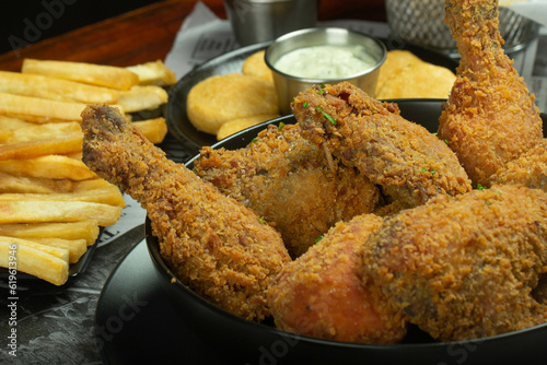 Crispy fried chicken, in wooden table