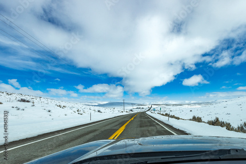 USA, Idaho, Bellevue, Highway through snow-covered landscape as seen from car photo