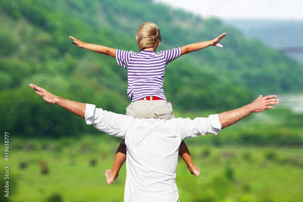 Father Carrying cute child Walking in forest Father Carrying cute child Walking in forest
