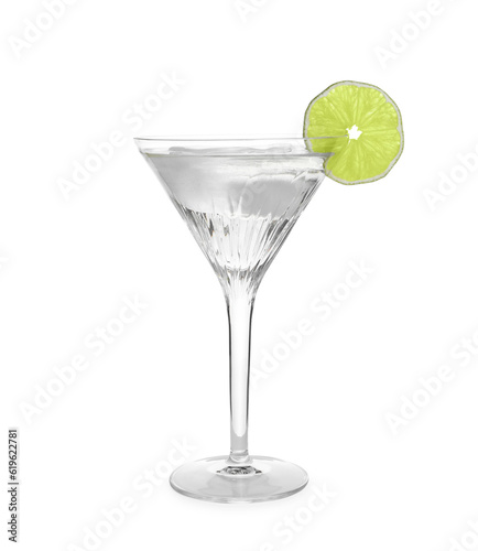 Martini glass of refreshing cocktail with lime and ice cubes isolated on white