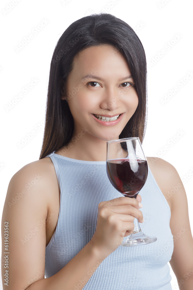 Beautiful Asian woman smiling and holding glass of red wine Beautiful Asian woman smiling and holding glass of red wine