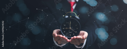 Картината върху платно clock on businessman hand, time management concept ,effective business planning