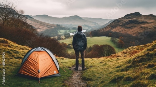 person camping in the picturesque landscapes of the Lake District generative ai