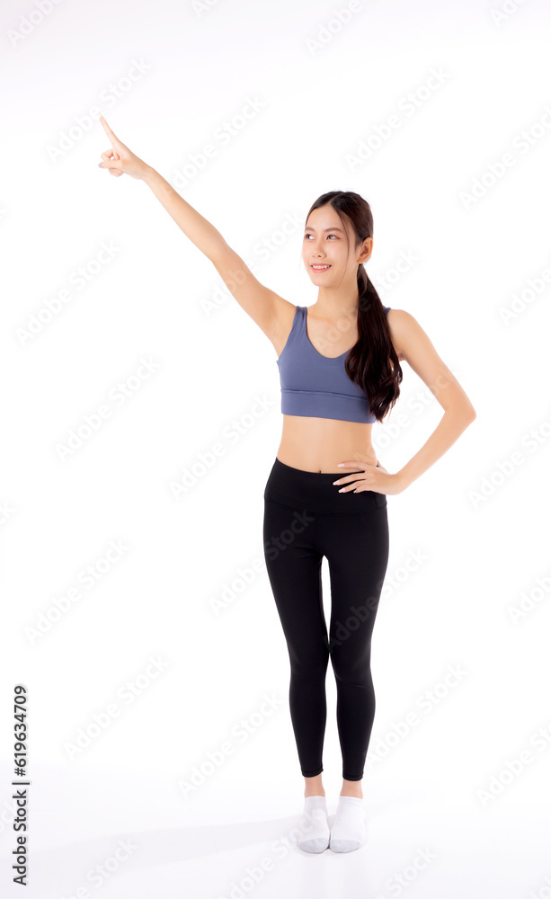 Portrait of beautiful young asian woman in sportwear smile and presenting isolated on white background, sport and exercise for health and weightloss, female and slimming showing something.
