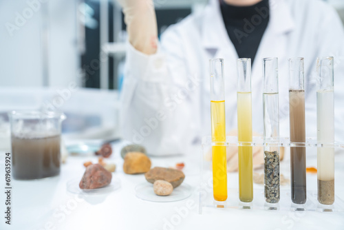 Geology science laboratory research concept, sample test analysis of nature dirtied ground in environment and ecology experiment, agriculture agronomy material to working with scientific equipment