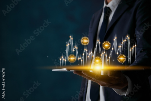 Half Body Businessman Hold Tablet and Stock Market Graph and Number Value in Dark Tone
