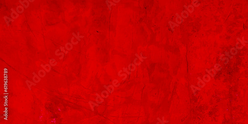 Red painted grunge texture background. Grunge texture of a dilapidated wall in a red tone