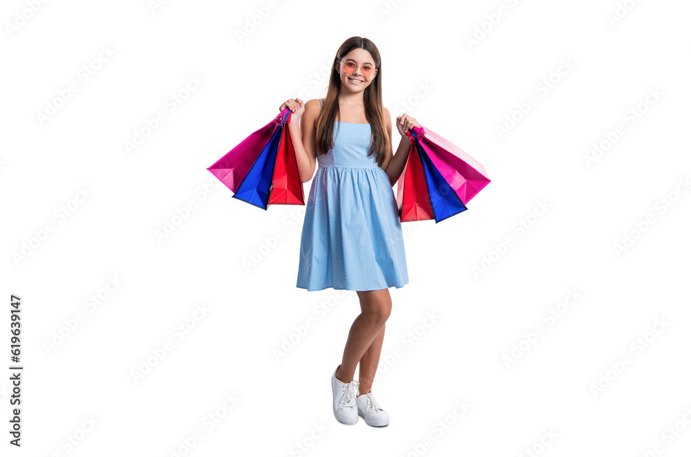 full length photo of teen girl at shopping with bags. teen girl at shopping isolated on white.