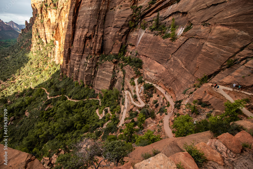 Long winding path trail leading to Angel's Landing with trees and rocks in Zion National Park in Utah 